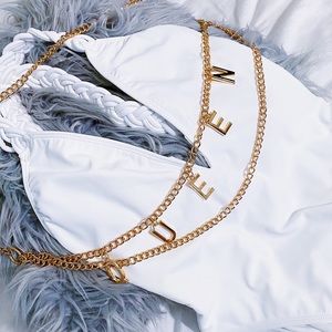 Brand New/ Never Worn White low back bathing suit.